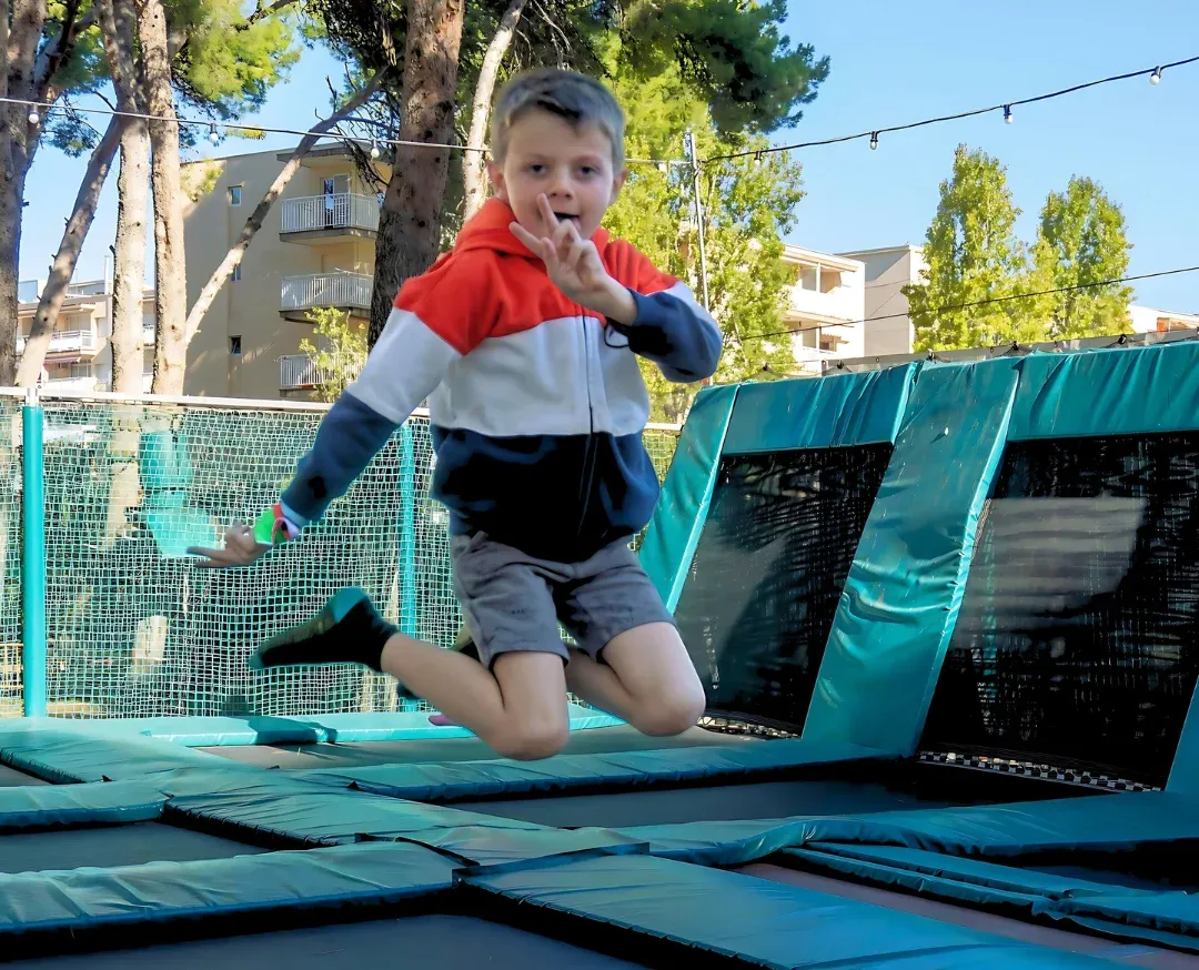children jumping on trampolines at Bosc Aventura Salou