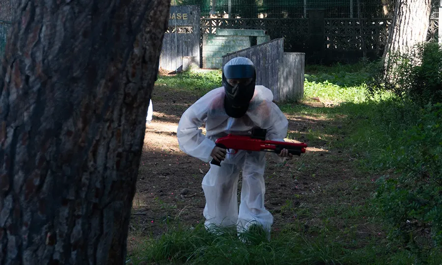 Student playing paintball during a school trip activity at Bosc Aventura Salou